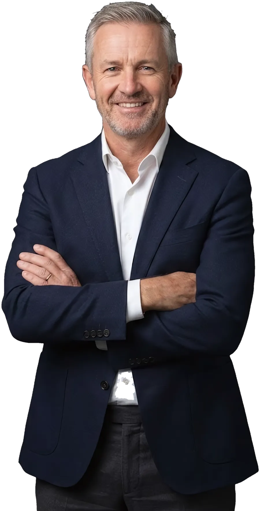 A B2B services director in a shirt, arms crossed, smiling