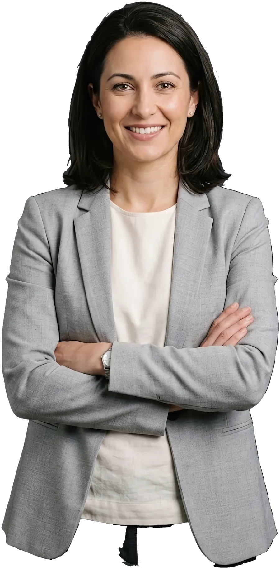 A solicitor in a suit, arms crossed, smiling